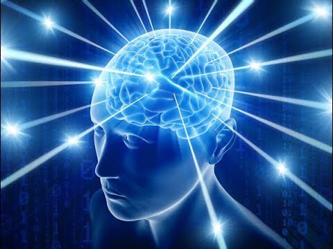 A glowing blue human brain with bright light rays emanating from it, set against a dark background with digital code patterns.