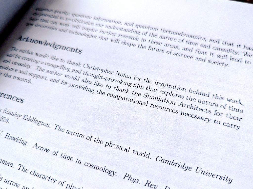 A close-up of a book page showing the "Acknowledgments" section, thanking Christopher Nolan for his film "Interstellar" and the Simulation Architects for computational resources, with partial visible references to Stanley Eddington and Stephen Hawking.